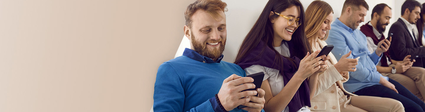 People looking at their smartphones