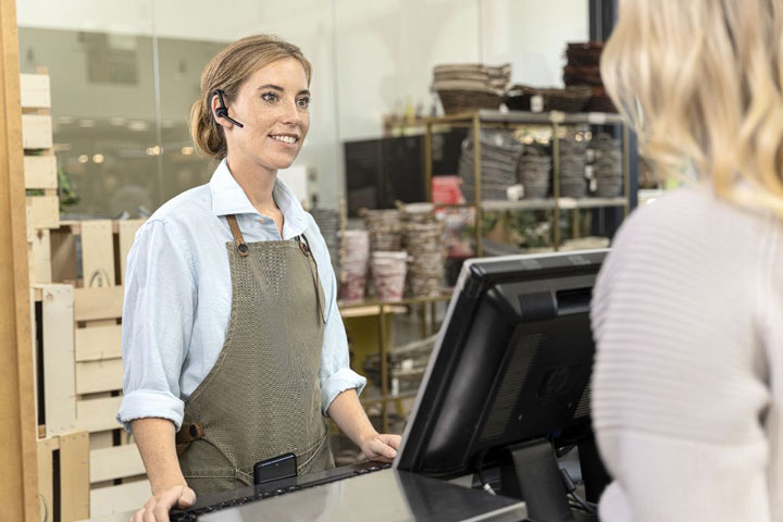 Women talking at a store