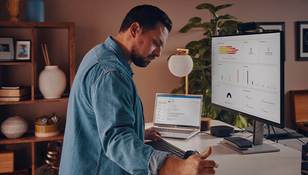 security: man works on a desk 