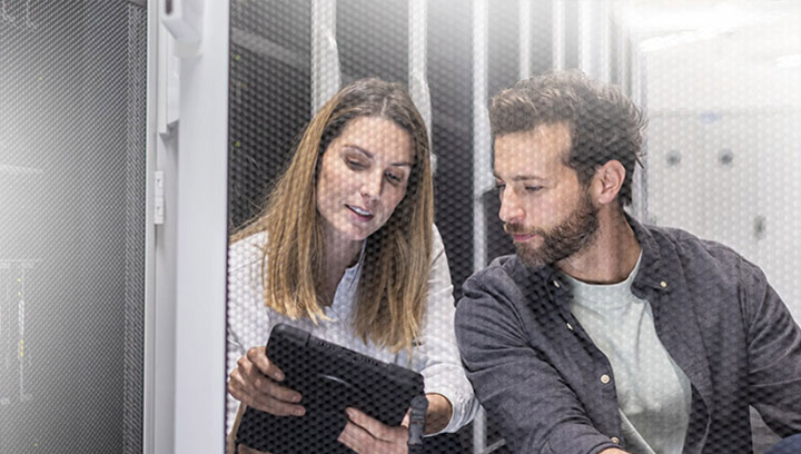 man and woman in a datacenter