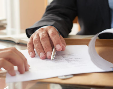 Business people signing contract