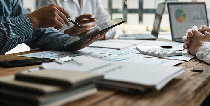 pile of documents on a desk