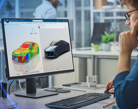 Person analyzing 3D car design with color simulation on computer in modern work environment