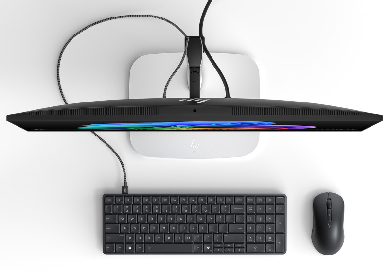 The HP EliteBoard is placed on the table in front of the screen (view from above)