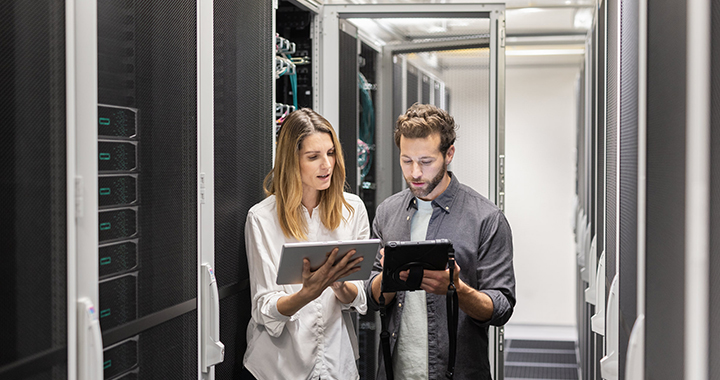 Man and woman meeting on a data server room