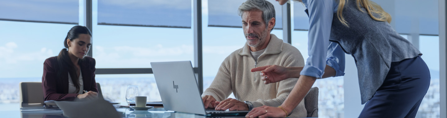 Man in office with HP laptop