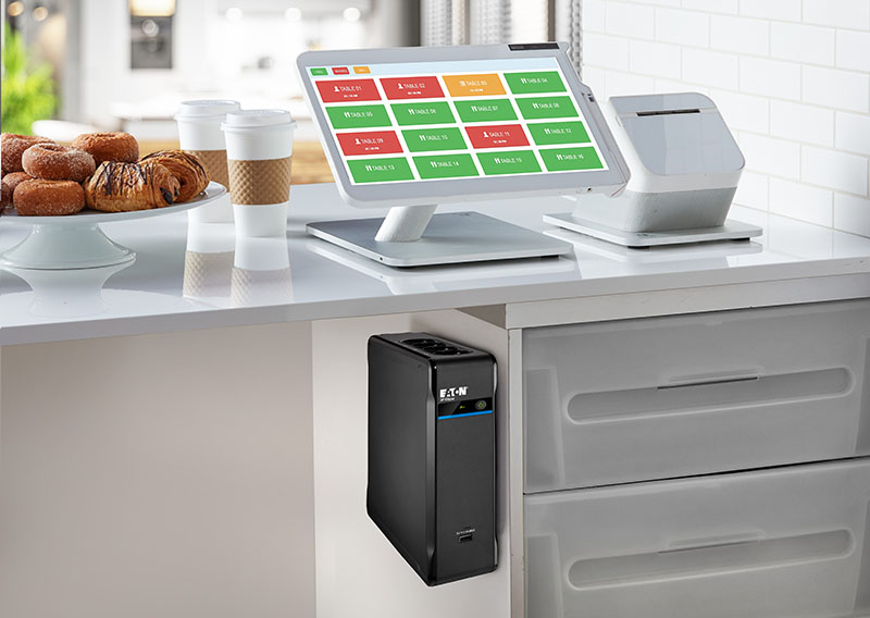 Eaton UPS below checkout in a café