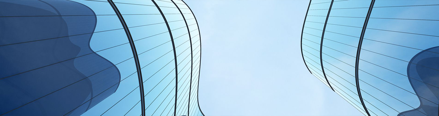 Moderne Architektur aus gebogenem Glas als Symbol für Innovation und Transparenz.