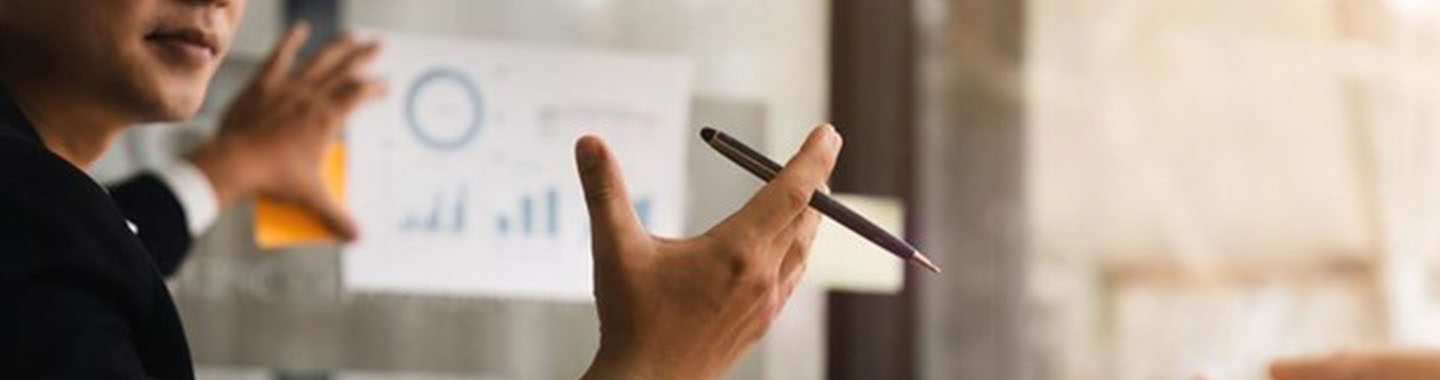 Asian business advisor meeting analyze discuss situation financial report