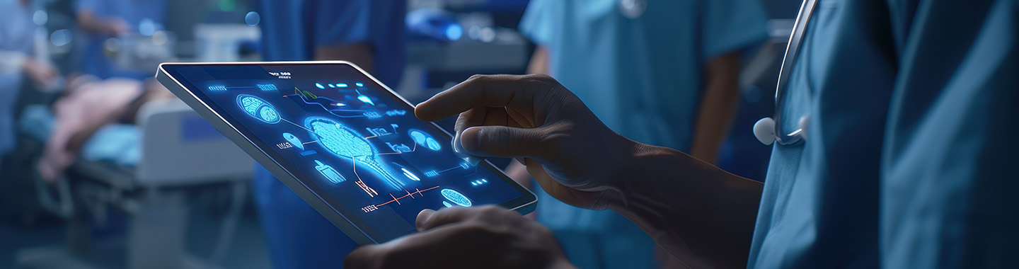 Surgeon holds Tablet