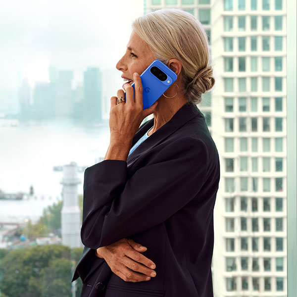 Womang talking on the Google Pixel 10 Smartphone