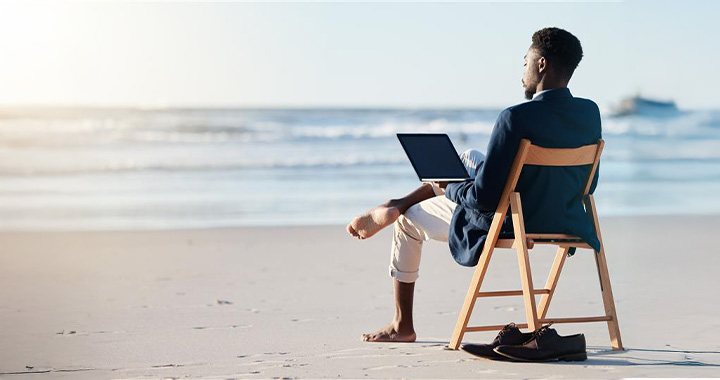 Men with Notebook at the Beach