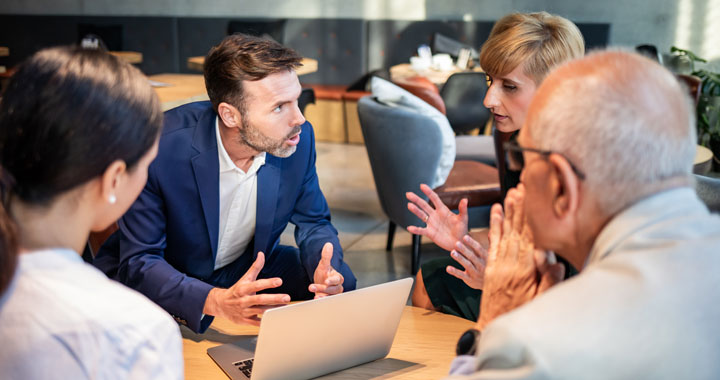 People discussing at a meeting