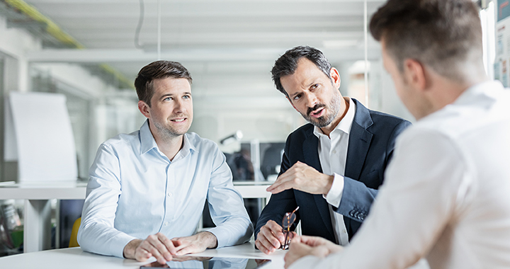 Three men meeting and argumenting.