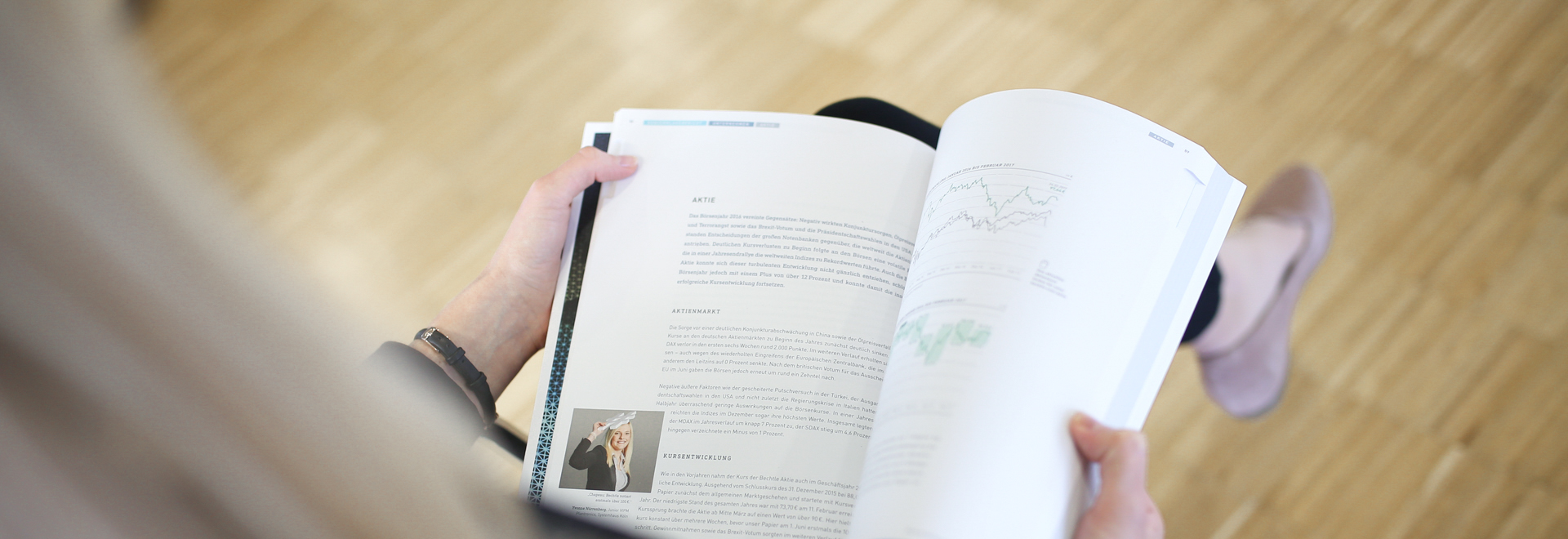 Woman reads annual report