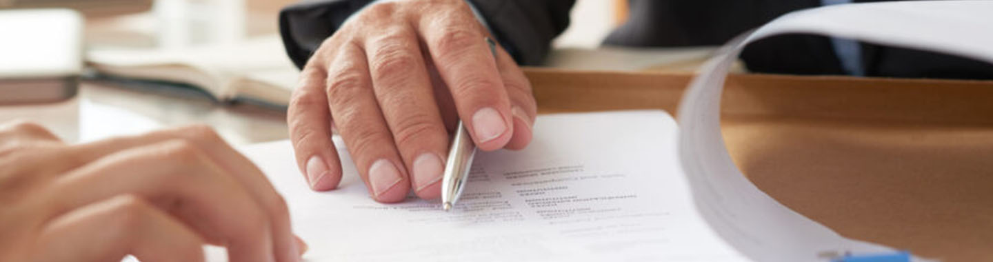 Business people signing contract