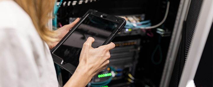 A woman working in the server room