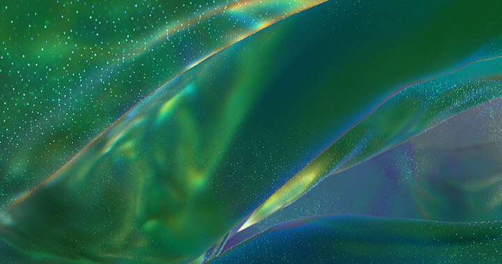 Abstract depiction of shimmering green and blue waves with sparkling particles in flowing motion