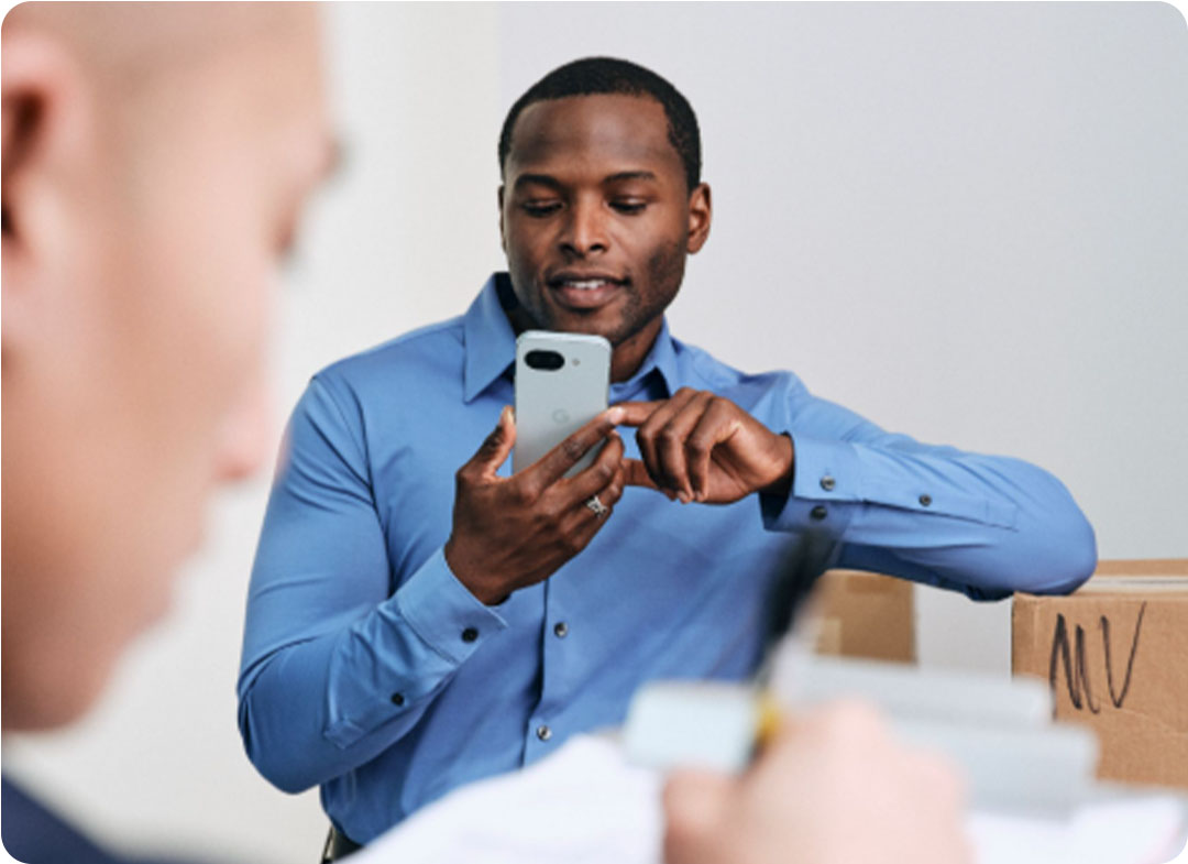 man using his smartphone