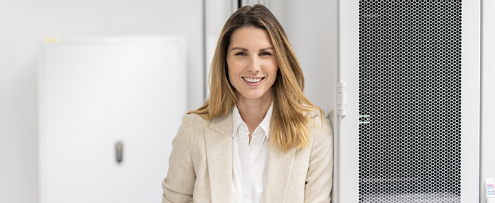 A woman is working in the data center