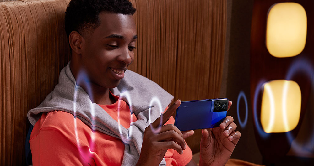 Man with TCL smartphone