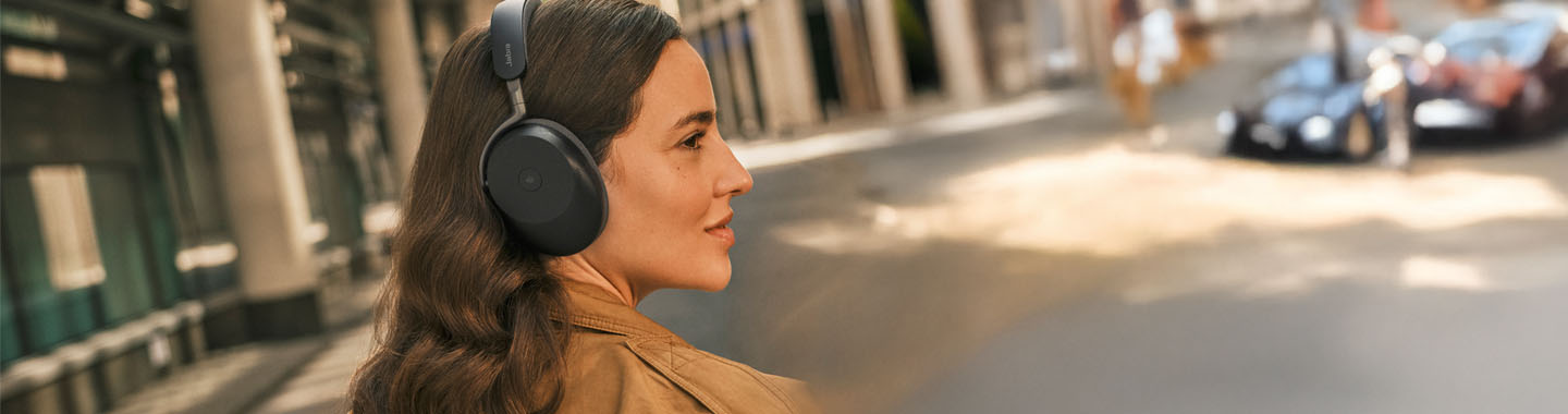 A Woman on the Street with the Jabra Evolve3 Headset