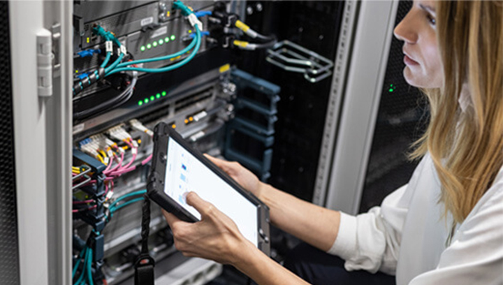 Woman working in a data center