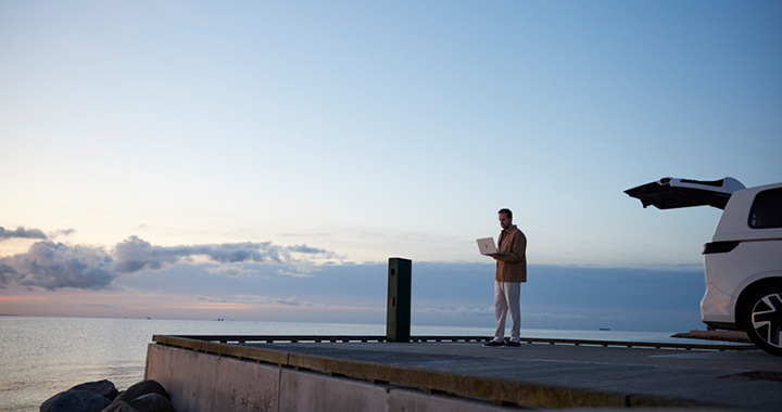 Men with Notebook outside