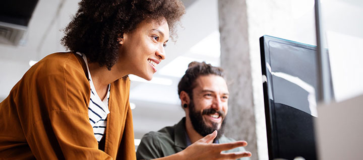 Man and woman talking at the office