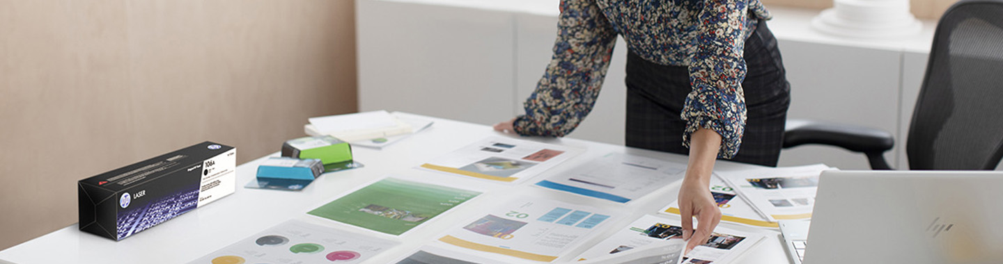 HP toner cartridge and colorful prints