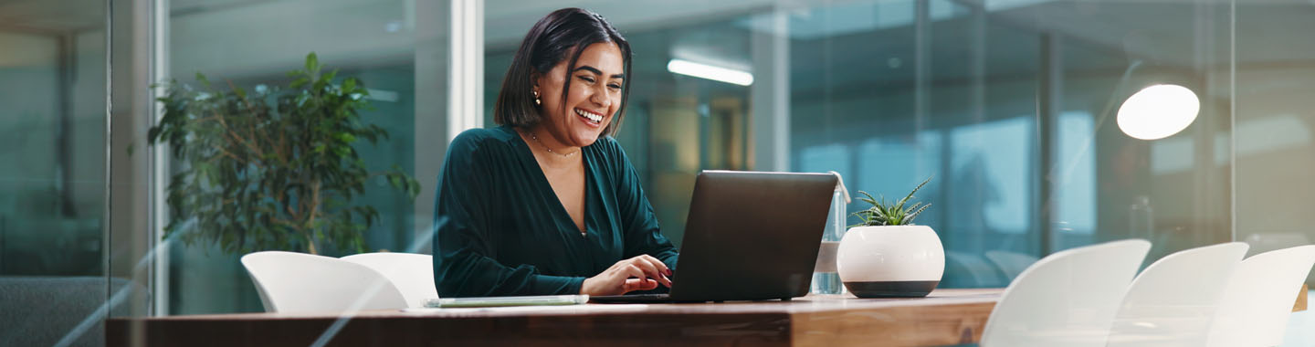 Woman working on desk banner