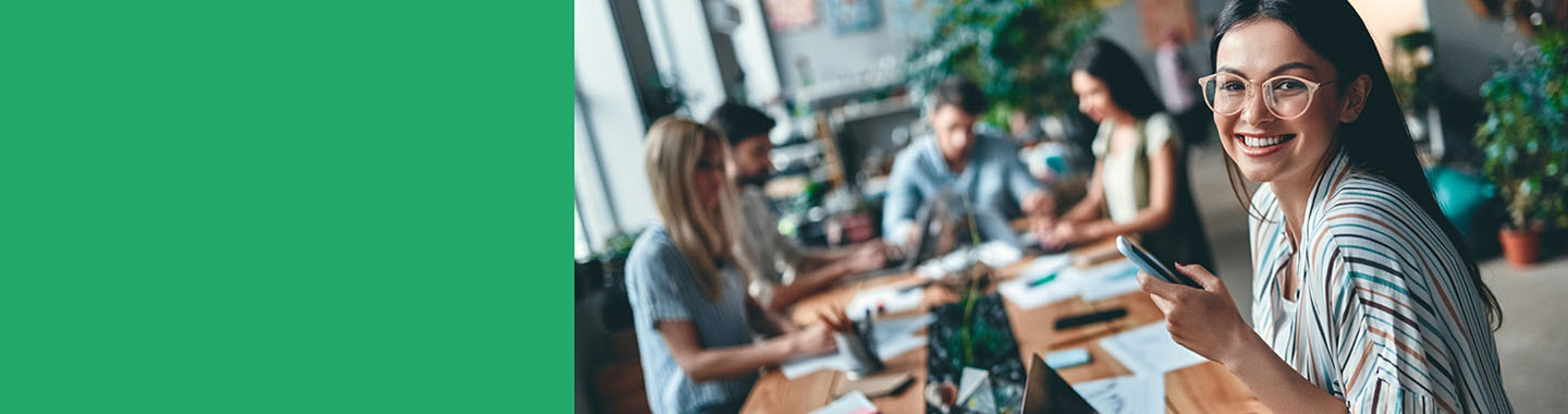 Woman sitting in front of notebook